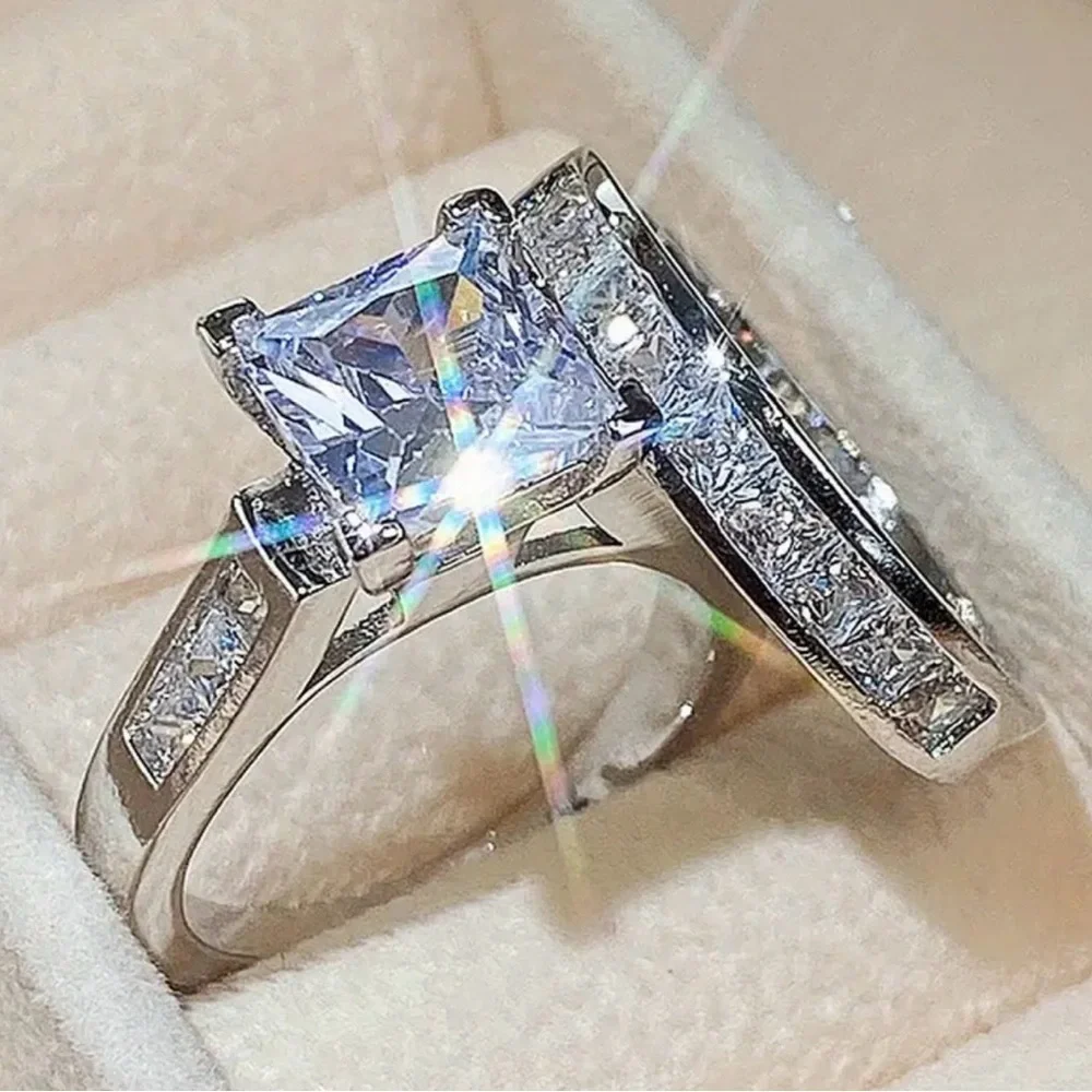 Elegant Silver and White Crystal Ring Set.